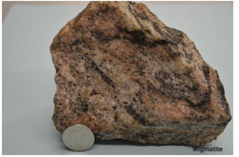 metamorphic rocks why do bands of minerals form when rocks are put under normal stress